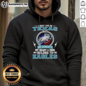 Fan wearing a Philadelphia Eagles hoodie, proudly supporting the team while living in Texas on game day.
