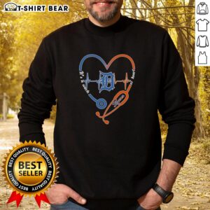 Alt Text: Detroit Tigers Heart and Soul sweatshirt with stethoscope and heartbeat design, perfect for baseball fans.