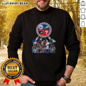 Original Philadelphia Sports Teams Snoopy sweatshirt featuring 76ers, Eagles, Flyers, and Phillies logos.