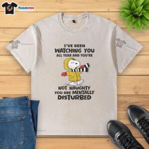 Pretty Snoopy 'I've Been Watching You All Year' T-shirt featuring a humorous twist on being 'mentally disturbed'.