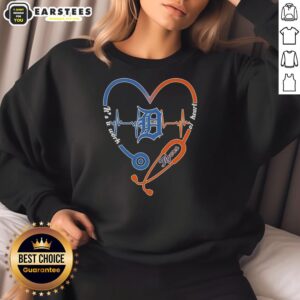 Awesome Detroit Tigers sweatshirt featuring a heart-shaped stethoscope and heartbeat design, perfect for fans.