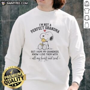 Cozy sweatshirt with 'I'm Not A Perfect Grandma' Snoopy design, expressing love for grandkids with heart and soul.