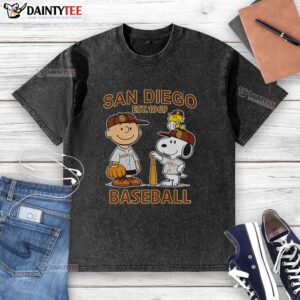 Alt Text: Charlie Brown, Snoopy, and Woodstock in a vintage Diego Padres baseball jersey, Est. 1969, on a washed t-shirt.