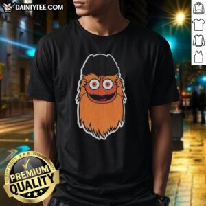 Alt Text: Official Joe Giglio proudly wearing a Gritty T-shirt, showcasing his love for sports and vibrant team spirit.