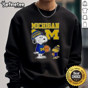 Snoopy and Woodstock in Michigan Wolverines jersey sweatshirt, showcasing adorable fan spirit and team pride.