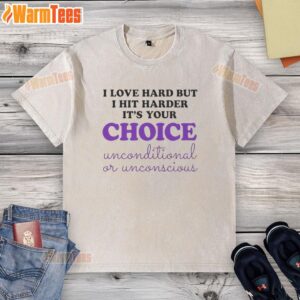 Good I Love Hard But I Hit Harder It's Your Choice washed t-shirt displayed on a wooden surface, showcasing its casual style.