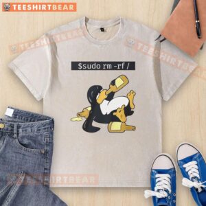 Alt Text: Funny Linux Tux graphic on a washed t-shirt featuring the command 'sudo rm -rf', perfect for tech enthusiasts.