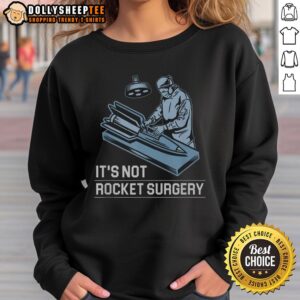 Cozy Top It's Not Rocket Surgery sweatshirt in a casual setting, perfect for everyday wear and relaxed outings.