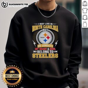 Pittsburgh Steelers sweatshirt with 'I may live in North Carolina, but my heart belongs to Steelers' slogan.