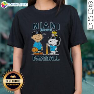 Charlie Brown, Snoopy, and Woodstock in Miami Marlins jersey, Est. 1993, on a stylish ladies tee design.