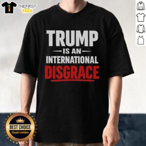 Pretty Trump Is An International Disgrace T-Shirt featuring bold graphic design and statement.