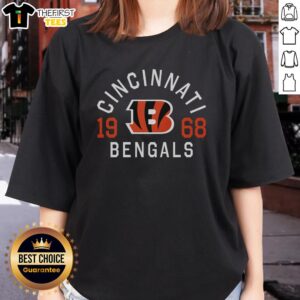 Official Cincinnati Bengals Heritage Print Ladies Tee showcasing team logo and vintage design for stylish fans.