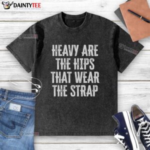Hot heavy are the hips that wear the strap washed t-shirt, showcasing a trendy design in a casual outdoor setting.
