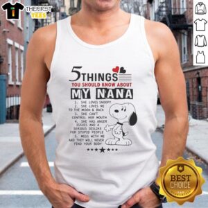 Woman wearing a 'To the Moon' Snoopy tank top, showcasing her love for Snoopy and family, perfect for casual outings.