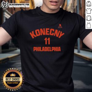 Travis Konecny 11 Philadelphia Flyers T-Shirt featuring vibrant team colors and logo, perfect for fans and collectors.