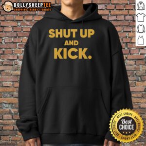 Alt Text: Harrison Butker of the Kansas City Chiefs wearing a Shut Up and Kick hoodie during a game day warm-up.
