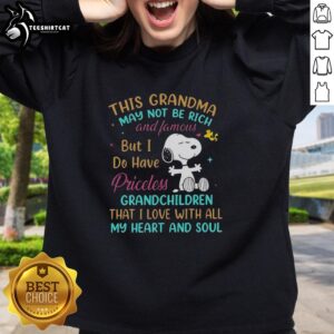 Premium Snoopy sweatshirt with 'This Grandma May Not Be Rich And Famous But I Do Have Priceless' text design.