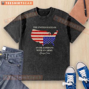 Alt Text: George Carlin washed t-shirt featuring 'Pretty, the United States is an oil company with an army' design.