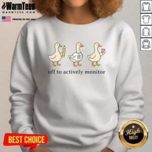 Alt Text: Teacher wearing a 'Good Off To Actively Monitor' sweatshirt on test day, embodying school spirit and readiness.