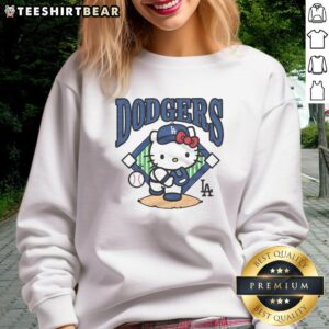 Awesome Hello Kitty x Los Angeles Dodgers first pitch sweatshirt featuring playful design and vibrant team colors.