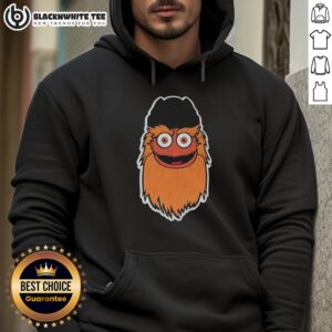 Original Joe Giglio wearing a Gritty Top hoodie, using an old computer, inspired by the internet cartoon character.