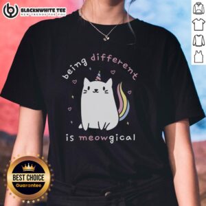 Alt Text: Good Being Different Is Meowgical Ladies Tee featuring a playful cat design with colorful text on a stylish shirt.