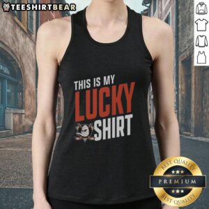 Girl wearing a pretty Anaheim Ducks tank top, showcasing her lucky team spirit at a hockey game.