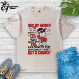 Snoopy wearing a red hoodie with the text 'Has my mouth gotten me in trouble? Yes, it pissed people off' on a T-shirt.
