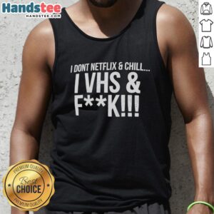 Premium tank top featuring 'I Don't Netflix And Chill, I VHS And F*ck' graphic for retro movie lovers.