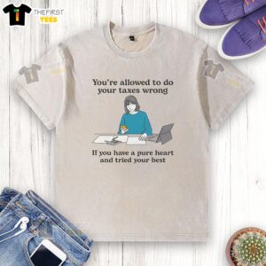 Alt Text: Premium washed t-shirt featuring 'You're allowed to do your taxes wrong if you have a pure heart' inspirational quote.