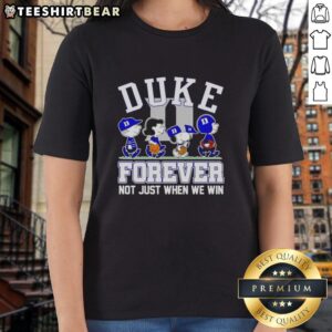 Cartoon characters on a 'Top Peanuts X Duke Blue Devils Forever Fan' ladies tee celebrating loyalty in sports.