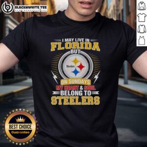 Alt Text: Pittsburgh Steelers t-shirt featuring 'I May Live In Florida But My Heart Belongs To Steelers' design.