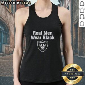 Man wearing a Pretty Las Vegas Raiders Real Men Wear Black tank top, showcasing team spirit and style in a casual setting.