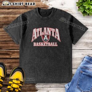Alt Text: Top Atlanta Hawks basketball logo on a stylish washed T-shirt, perfect for fans and casual wear.
