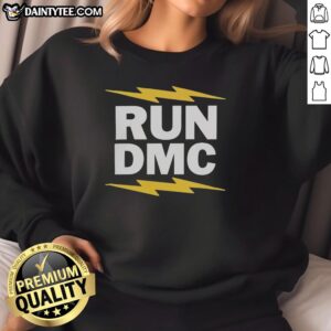 Original Run DMC electric sweatshirt featuring bold logo and vibrant design, perfect for hip-hop fashion enthusiasts.
