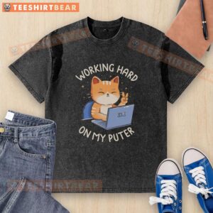 Person wearing a 'Good Working Hard On My Computer' washed t-shirt while focused on laptop, showcasing work-from-home vibes.