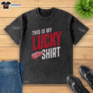 Hot Detroit Red Wings 'This Is My Lucky' washed t-shirt displayed on a hanger, perfect for fans and collectors.