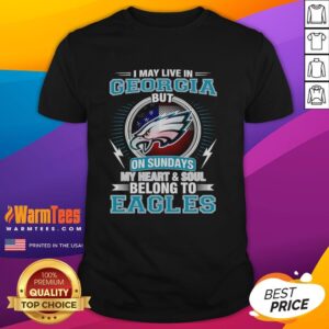 Good Philadelphia Eagles t-shirt featuring 'I May Live In Georgia But My Heart Belongs To Eagles' slogan.