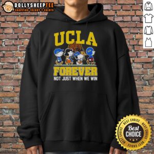 Alt Text: Original Peanuts x UCLA Bruins hoodie featuring cartoon characters and 'Forever Fan, Not Just When We Win' slogan.