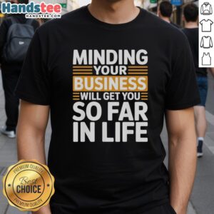 Premium vintage T-shirt featuring 'Minding Your Own Business Will Take You Very Far In Life' motivational quote design.