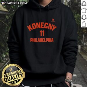 Official Travis Konecny Philadelphia Flyers hoodie displayed on a mannequin with team colors and logo visible.