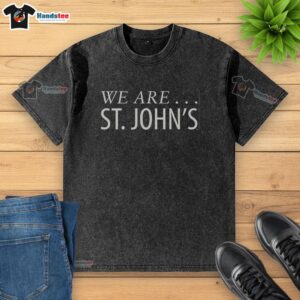 Official St. John's Basketball 'We Are' washed t-shirt featuring bold team graphics and a comfortable fit.