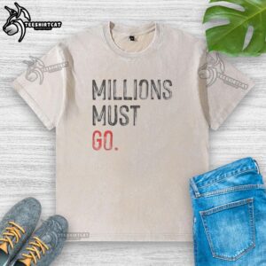 Premium Millions Must Go washed t-shirt in vibrant colors, showcasing soft fabric and stylish design for casual wear.