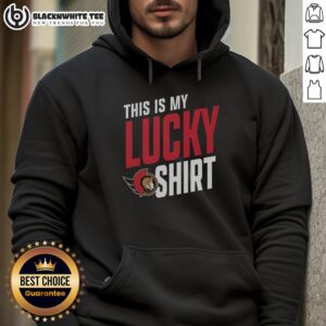 Person wearing a Nice Ottawa Senators hoodie, showcasing team spirit and style at a hockey game.