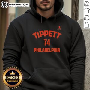 Alt Text: Owen Tippett wearing a Philadelphia Flyers hoodie, showcasing team spirit and style in a vibrant setting.