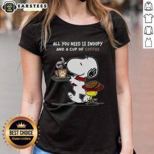Adorable ladies' tee featuring Snoopy and coffee, perfect for casual wear and dog lovers. Cute and comfy design.