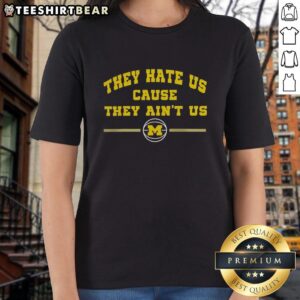 Top Michigan Wolverines basketball 'They Hate Us Cause They Ain't Us' ladies tee featuring team colors and logo.