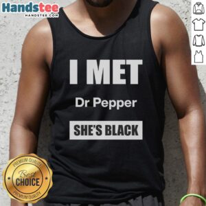 Stylish black tank top featuring 'Top I Met Dr. Pepper' design, perfect for casual outings and soda lovers.