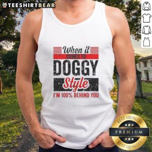 Retro tank top featuring a playful dog graphic with the phrase '100% Behind You' for dog lovers and pet enthusiasts.