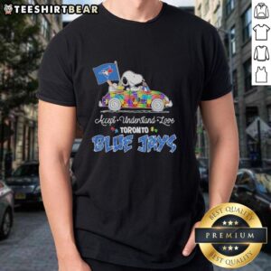 Pretty Snoopy and Woodstock driving a car on a Toronto Blue Jays T-shirt promoting autism acceptance and love.